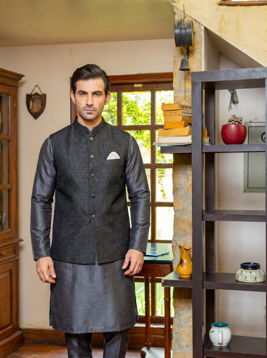 Charcoal Grey Raw Silk Diamond Weave Waistcoat Front View – Versatile Groom Wear Amin Selected Karachi